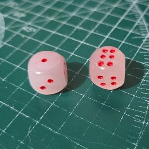 Pink Mangano Calcite Dice pair; UV reactive